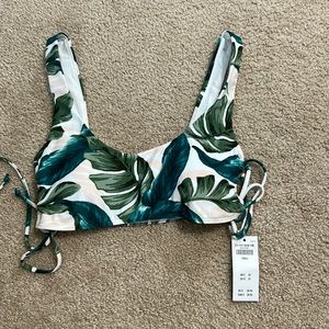 Hollister bikini top white tropical print with green and pink leaves. Size S.